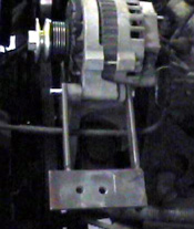 Fabricated bracket installed onto existing alternator